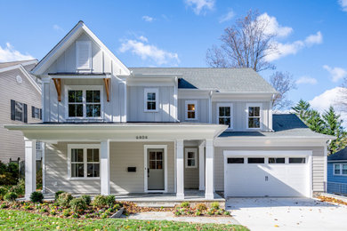 Inspiration for a farmhouse gray three-story exterior home remodel in DC Metro