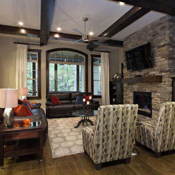 Living room with stacked stone fireplace
