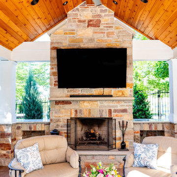 Pool Side Covered Patio with Fireplace and Bar Area