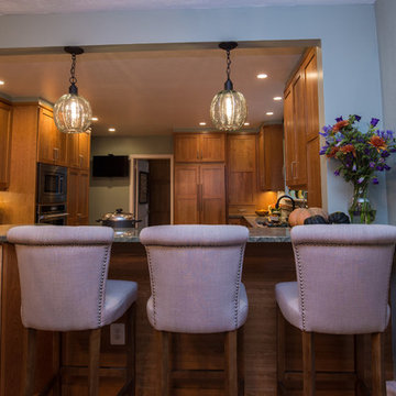 Warm Wood Kitchen Remodel | Natural Cherry Cabinetry, Granite Surfaces