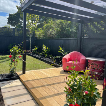 Lush Tropical Garden with Pergola