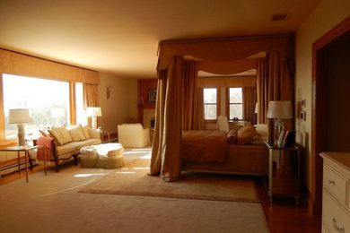 Huge elegant bedroom photo in Bridgeport with a standard fireplace and a stone fireplace