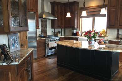 Eat-in kitchen photo in Denver with an island
