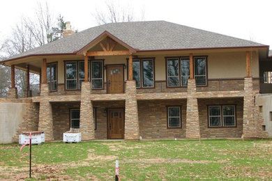 Photo of an arts and crafts home design in Dallas.