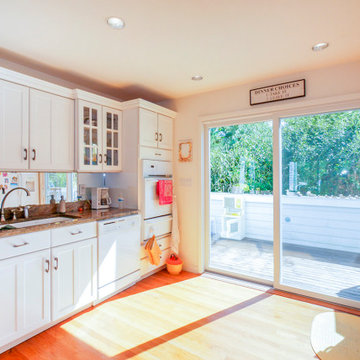 Bright Beach House Kitchen with New Patio Door from Renewal by Andersen