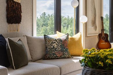 Example of a mid-sized transitional open concept light wood floor, shiplap ceiling and wallpaper living room design in Toronto with beige walls, a wood stove, a tile fireplace and a media wall