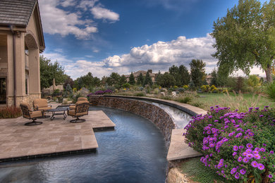 Inspiration for a traditional custom-shaped pool in Denver.