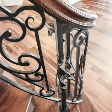 Project #74 | Circular Staircase with Hand-Forged Metal Panels