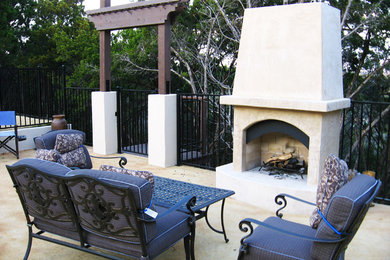 Example of a gray concrete exterior home design in Austin
