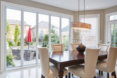 Mid-sized transitional porcelain tile and white floor great room photo in Toronto with beige walls and no fireplace