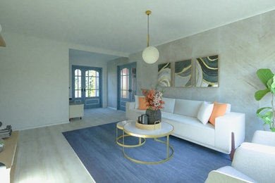 Modelo de sala de estar actual de tamaño medio con paredes blancas, suelo laminado, televisor colgado en la pared y suelo beige