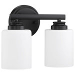 Craftmade - Bolden 2-Light Bathroom Vanity Light in Flat Black - Bold clean lines with your choice of clear seeded or white frosted glass shades complement the graceful shapes of the Bolden collection setting the stage for a look that is luxurious and effortless.  This light requires 2 , . Watt Bulbs (Not Included) UL Certified.