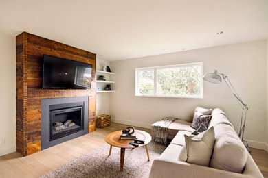 This is an example of an arts and crafts family room in Vancouver.