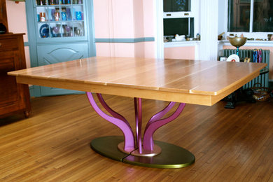Inspiration for a mid-sized eclectic light wood floor and brown floor enclosed dining room remodel in Other with pink walls