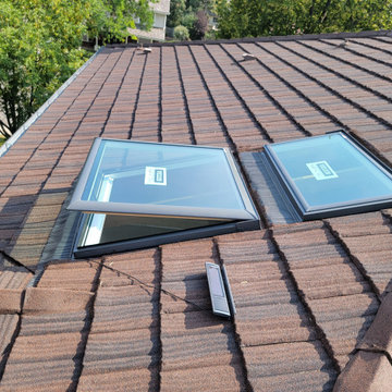 Velux Solar-Powered Venting Skylights on Stone-Coated Steel Roof