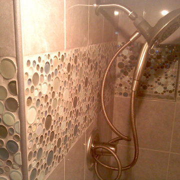 tile shower with bubble accent tiles