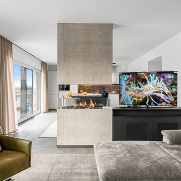 Raumtrenner mit Kamin und dreh- und versenkbarem Fernseher