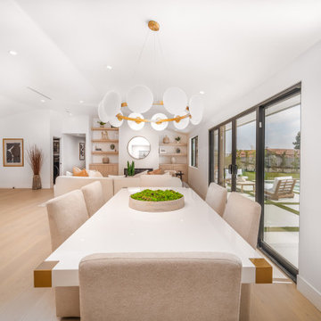 Dining Table Set Along the Rear Glazing and Sliders
