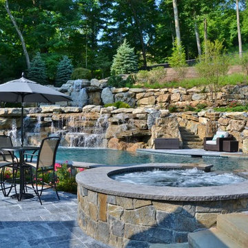 Pool and Spa with Water Feature Built into Mountainside - Mahwah, NJ