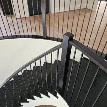 Project #130 | Curved Staircase with Wraparound Balcony
