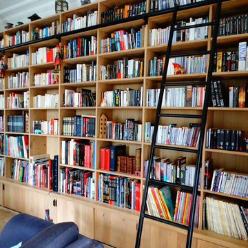 Bibliothèque bois massif avec échelle sur rail