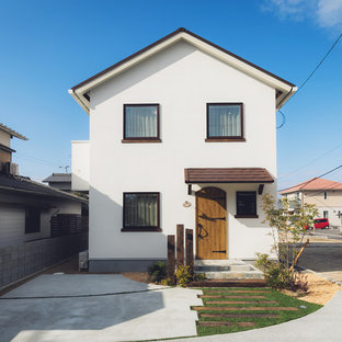 他の地域のカントリー風おしゃれな白い家 (切妻屋根、戸建) の写真