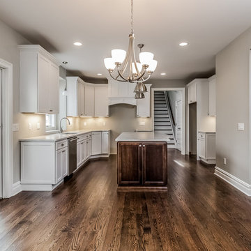 Direct Depot | Two-Toned White Kitchen with Medium Stain Island