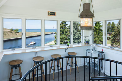 Sunroom - huge coastal sunroom idea in Grand Rapids