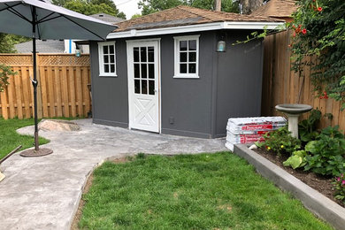 Example of a mid-sized beach style exterior home design in Toronto