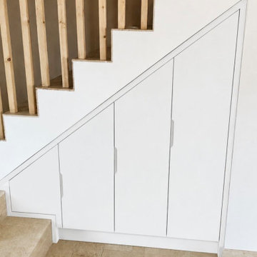 Placard sous escalier sur mesure dans une maison individuelle à Montreuil (93)