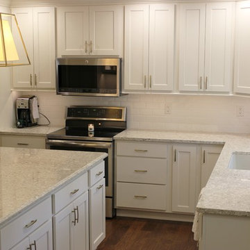 Davenport, IA- White Painted Kitchen With Gold Accents and Large Island