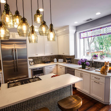 Transitional White Kitchen Remodel | Glass Display Cabinets & Custom Island