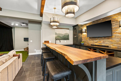 Design ideas for a transitional home bar in Minneapolis.