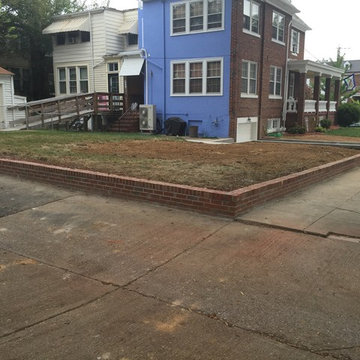 New Concrete Driveway Entrance, Retaining Walls, and New Iron Fence