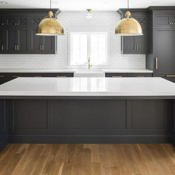 Moody Kitchen And A Bright Bathroom
