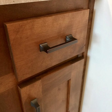 Rustic Birch Briarwood Koch Cabinets with MSI Solare Quartz Tops