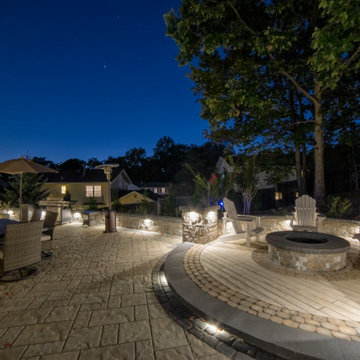 Dual patio with adjoining firepit feature