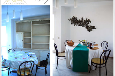 Esempio di una grande sala da pranzo aperta verso la cucina minimal con pareti bianche, pavimento con piastrelle in ceramica e pavimento grigio
