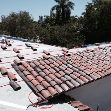 D. Wade Artezanos Hybrid Clay Barrel Tile Roof with "Invisible" Solar Thermal