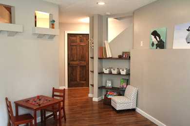 Large elegant look-out vinyl floor basement photo in Minneapolis with gray walls