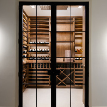 Modern Glass-Enclosed Wine Cellar with Custom Oak Racking | Chicago