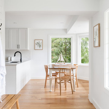 Bright Entry, Dining Nook with Blue Front Door – Shawnigan Lake, BC