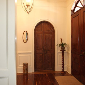 View from salon into office with antique doors