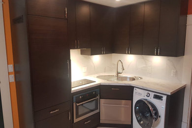 Small trendy l-shaped marble floor and white floor kitchen photo in Vancouver with a drop-in sink, flat-panel cabinets, dark wood cabinets, quartz countertops, white backsplash, stone slab backsplash, stainless steel appliances and white countertops