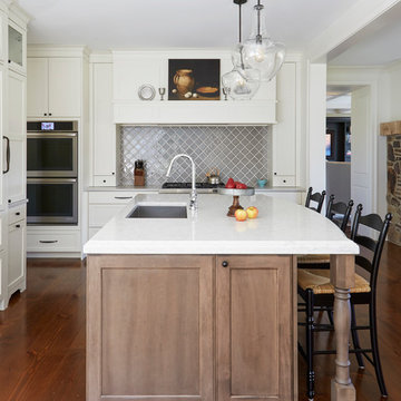 Wood Range Hood with Gray Tile Backsplash