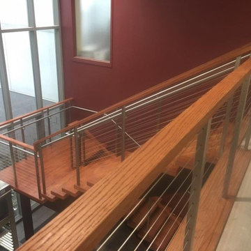 Double steel stringer open risers and cable railing