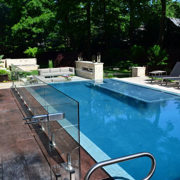 NJ Landscape Architecture Design- Custom Perimeter Overflow Pool with Sun Shelf