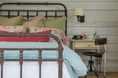 Cottage carpeted bedroom photo in Dallas with white walls