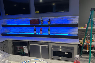 Inspiration for a home bar remodel in Detroit