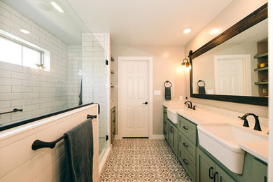 This is an example of a large country master bathroom in Other with shaker cabinets, green cabinets, an alcove shower, a two-piece toilet, white tile, subway tile, beige walls, porcelain floors, an undermount sink, engineered quartz benchtops, multi-coloured floor, a hinged shower door, white benchtops, a shower seat, a double vanity and a built-in vanity.